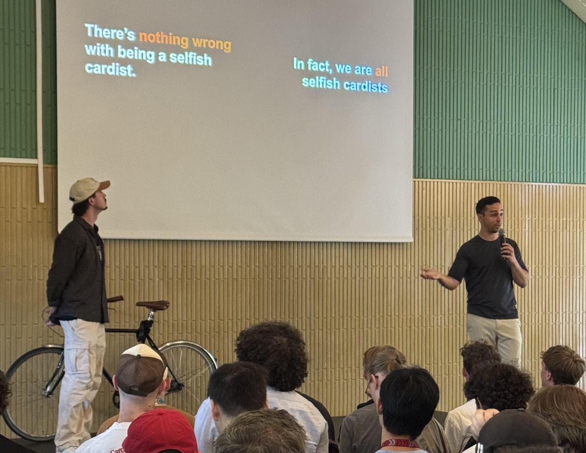 Dom presenting to a full room at Cardistry-Con 2026